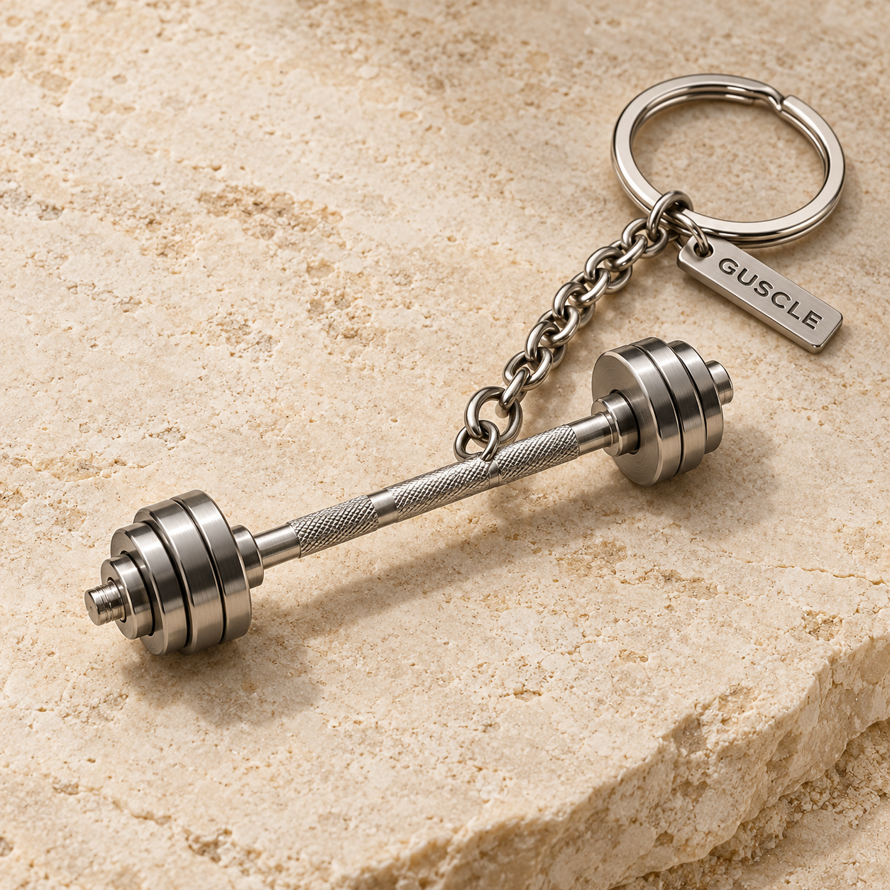 GUSCLE miniature steel barbell keychain with engraved tag